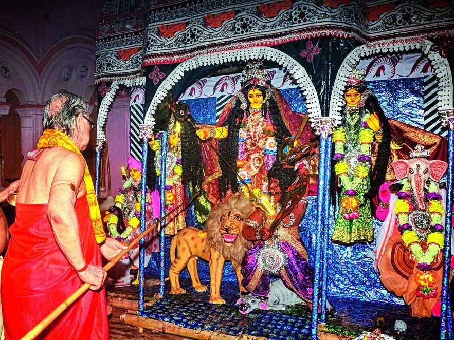 Tripura Durga Bari Basanti Puja: Two-Armed Durga Tripura, Manikya Dynasty Traditions.